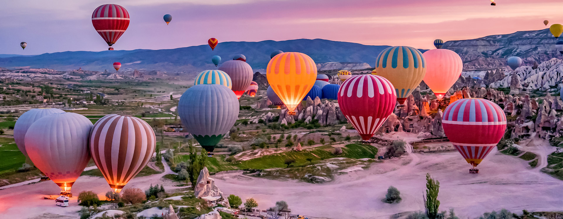 Colorful hot air balloons before launch in Goreme national park, Cappadocia, luxury holidays toTurkey