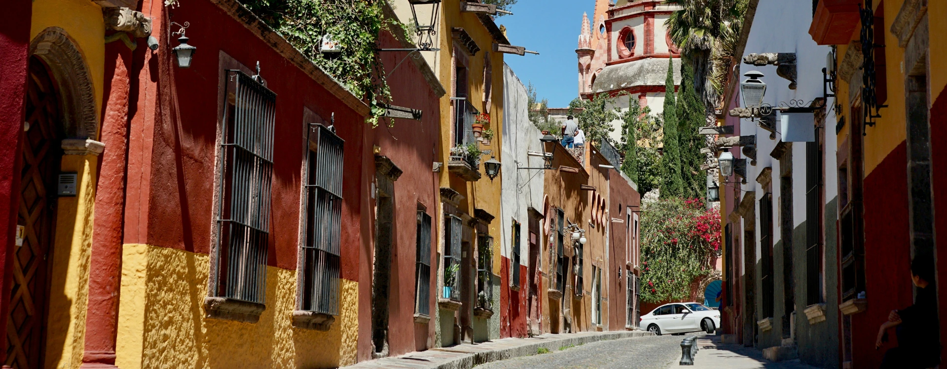 view of street in central america with colourful buildings
