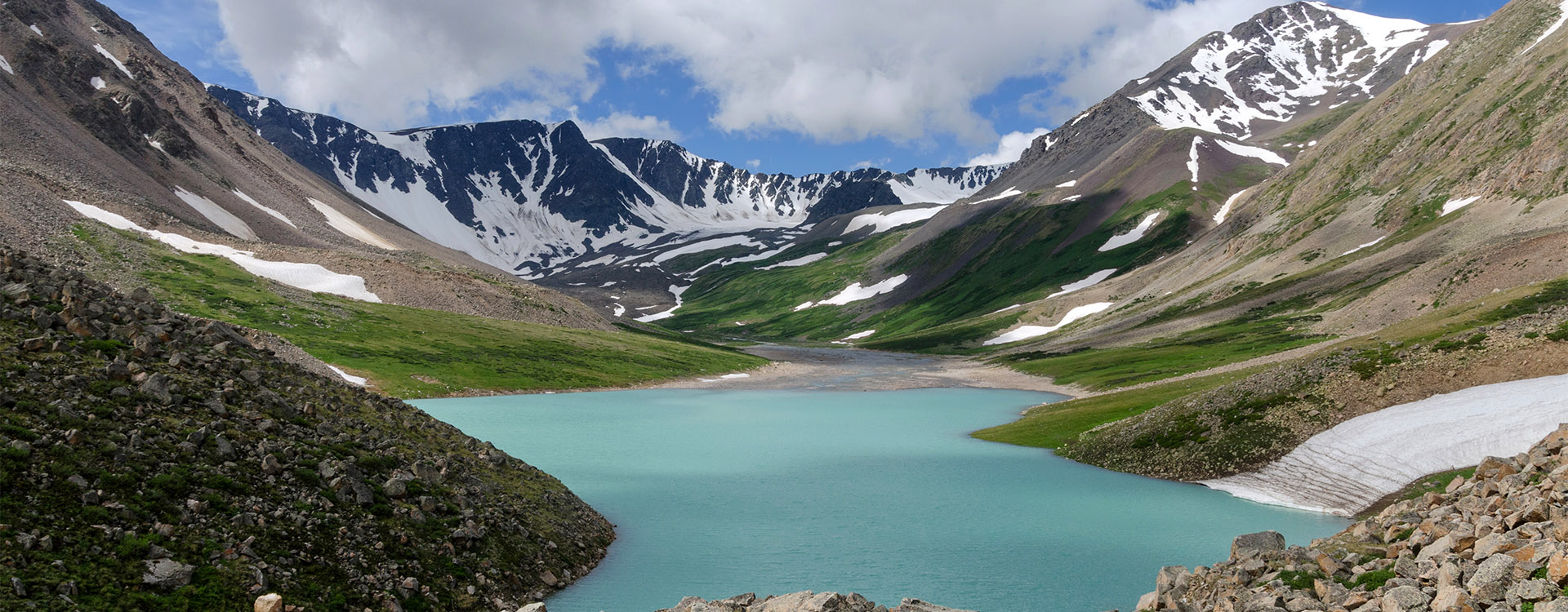 Western Mongolia mountain landscape. Alpine lake. Altai Tavan Bogd National Park, Mongolia
