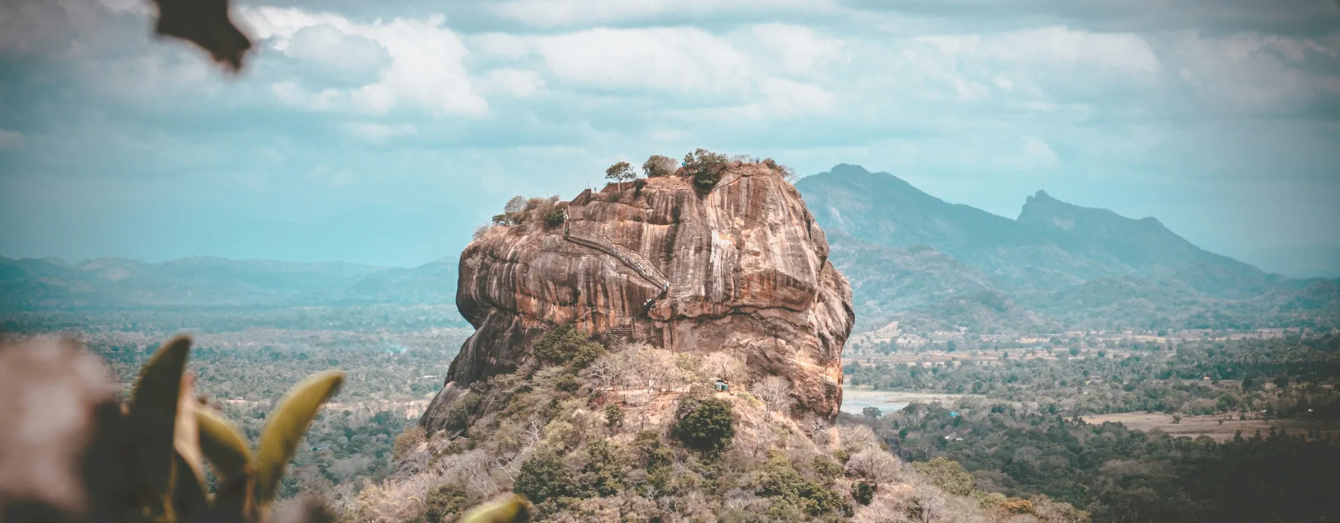 Sigiriya, or Lion Rock, is an ancient rock fortress and UNESCO World Heritage Site in Sri Lanka