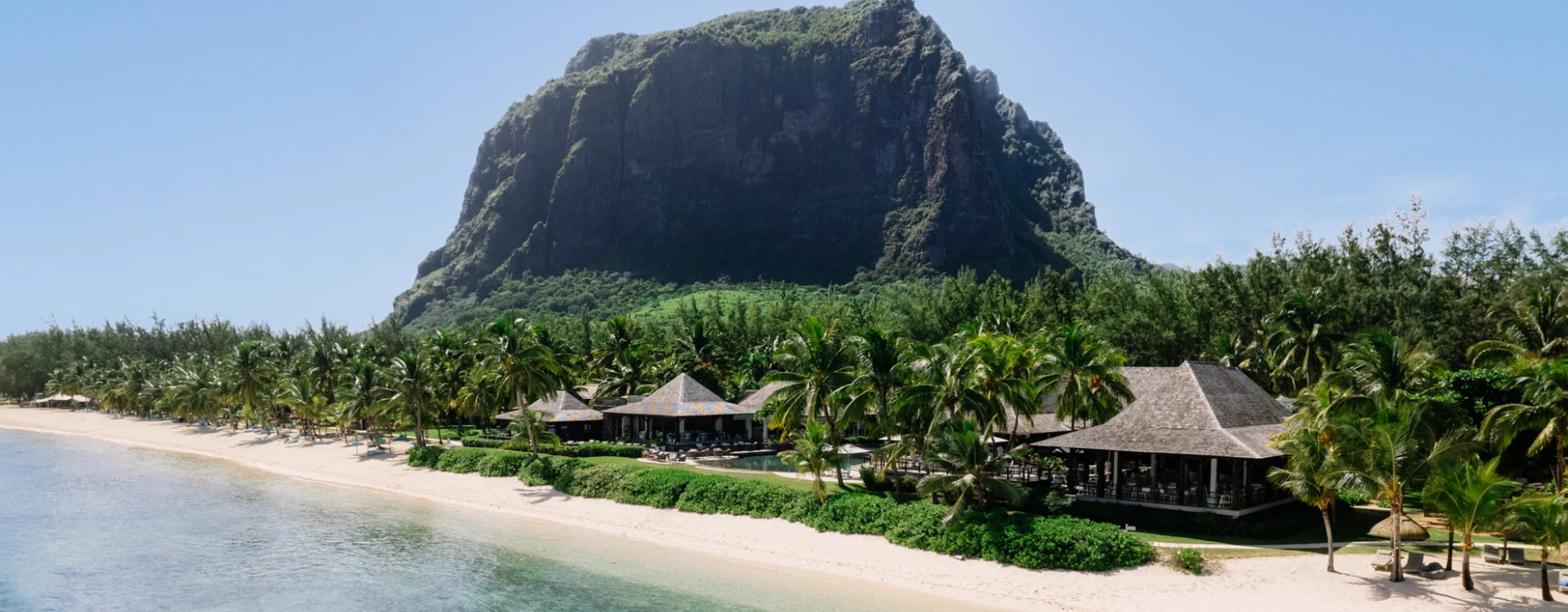 Lux Le Morne, with dramatic landscape in the background