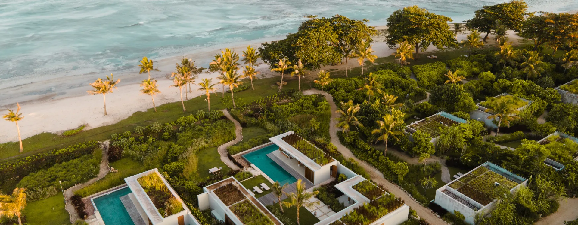 aerial image of luxury hotel rooms on a beach in sumba